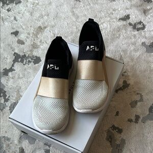 APL Metallic Gold and Black Slip-On Shoes!